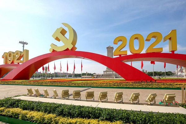 tian"anmen square adorned with flowers